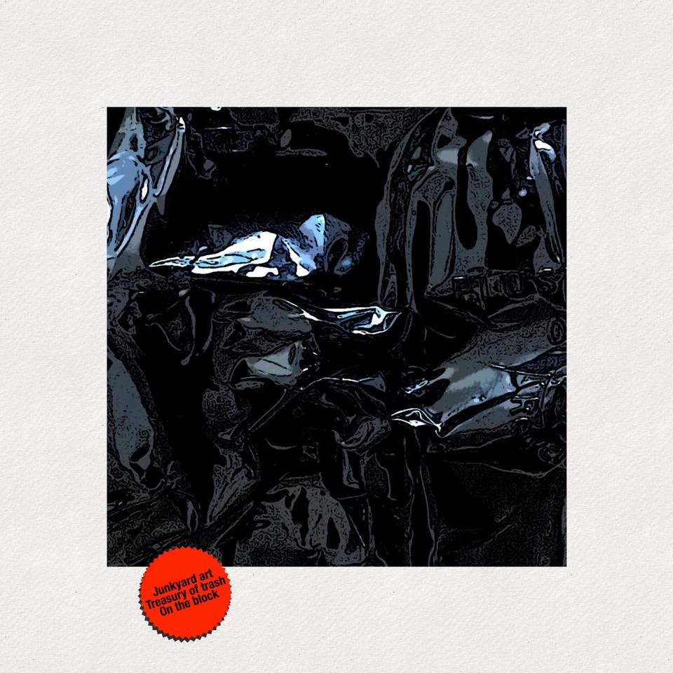 Junkyard Art Treasury of trash On the block